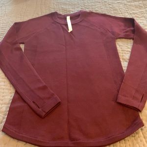 Lululemon burgundy sweater. New without tags.